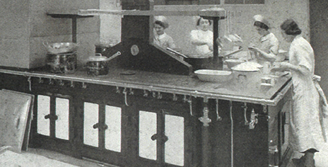 photo of people working in a kitchen